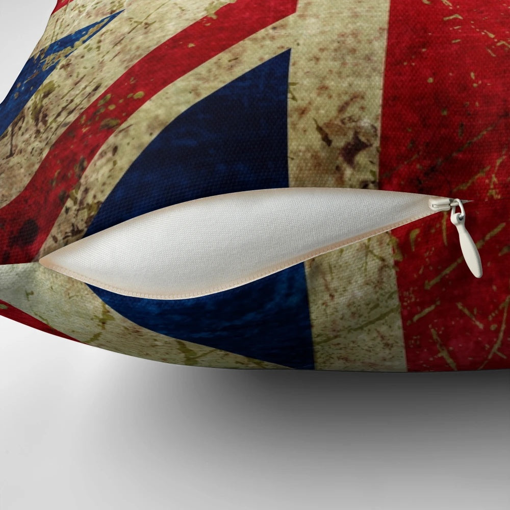 Decorative throw pillow with a grunge union jack design and worn, scratched metal effect