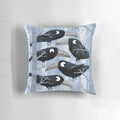 Throw pillow featuring a digital art design of guilty looking crows on a grey background