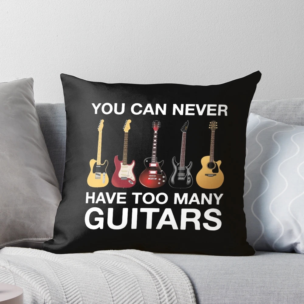 A cozy pillow featuring an electric guitar and the phrase "You Can Never Have Too Many Guitars