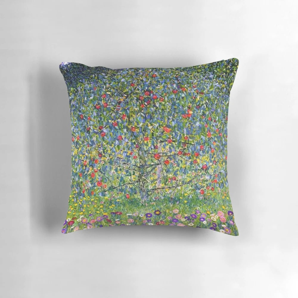 Gustav Klimt's Apple Tree I painting reproduced on a soft, high-quality pillow