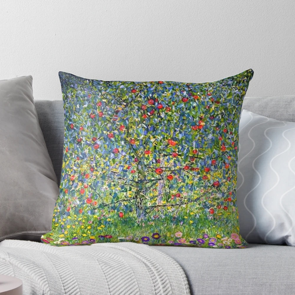 Gustav Klimt's Apple Tree I painting reproduced on a soft, high-quality pillow