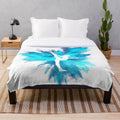 Blue and white gymnast silhouette design on a cozy plush blanket