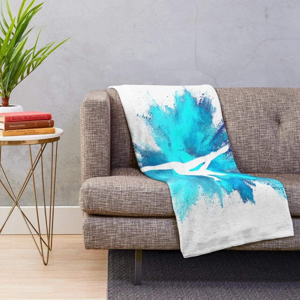 Blue and white gymnast silhouette design on a cozy plush blanket