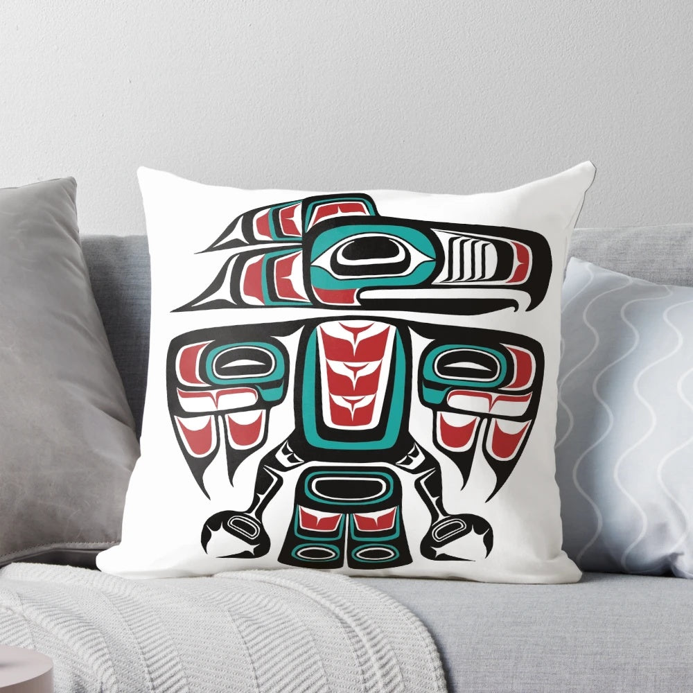 Haida-inspired raven totem design on a decorative pillow