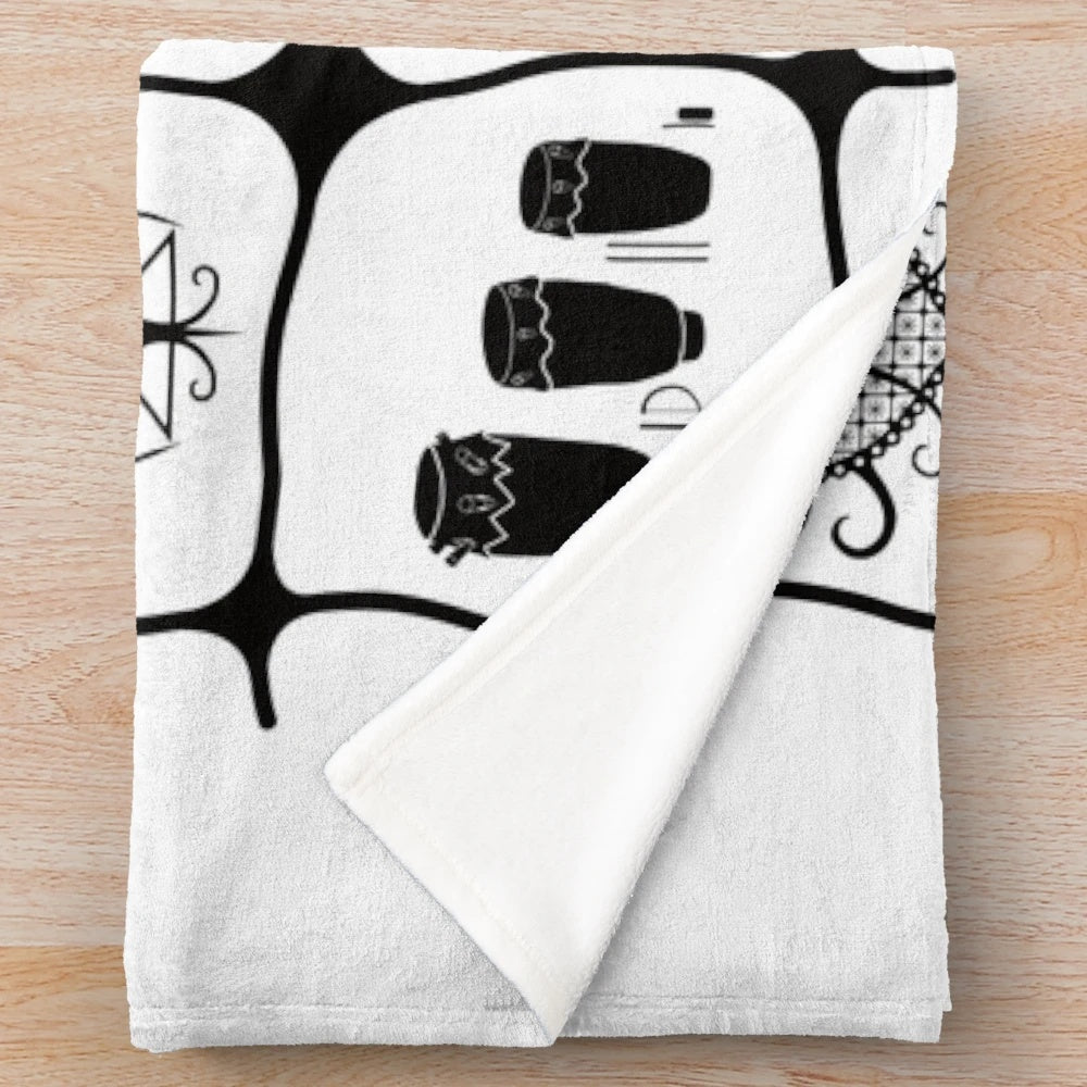 Haitian inspired plush blanket with voodoo symbols and Kesler Pierre art