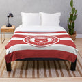 Hamilton FC inspired plush blanket with team colors and logo