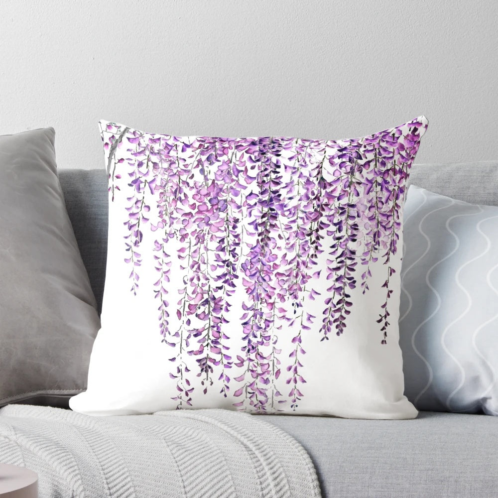 A vibrant hand-painted purple wisteria floral design on a pillow cover.