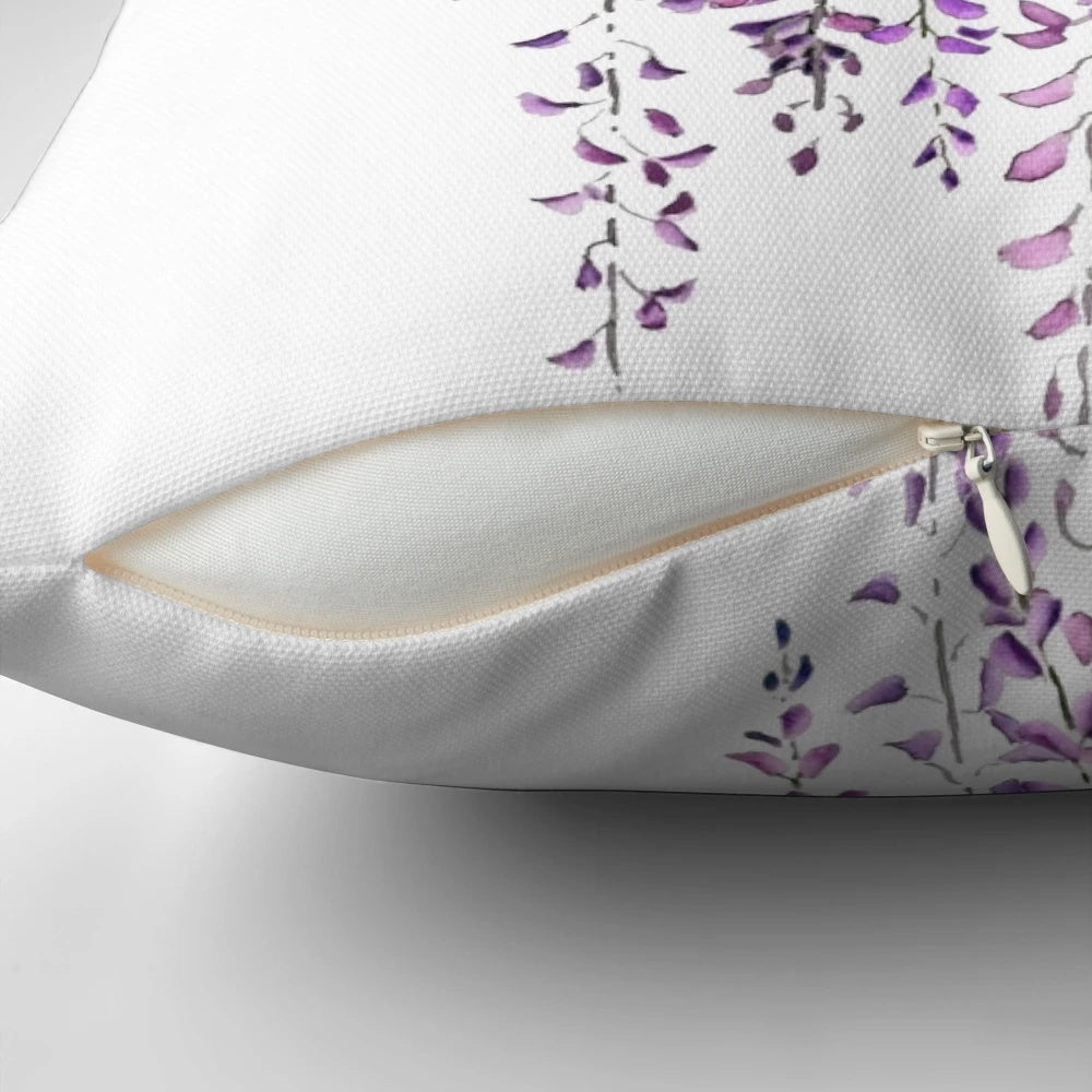 A vibrant hand-painted purple wisteria floral design on a pillow cover.