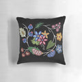 Vibrant Anishnawbe-inspired pillow with intricate patterns and earthy tones