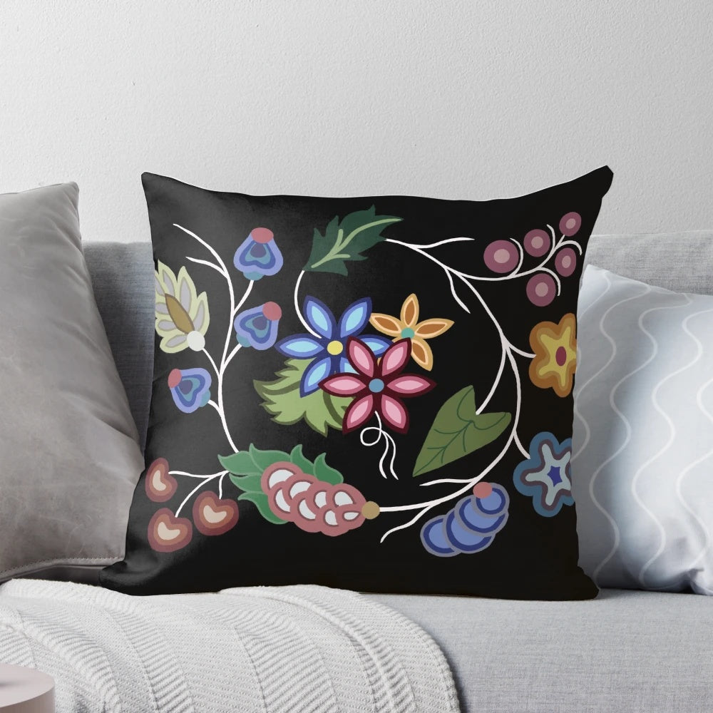 Vibrant Anishnawbe-inspired pillow with intricate patterns and earthy tones
