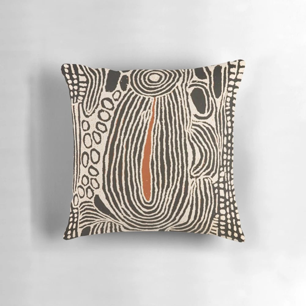 Decorative throw pillow featuring a vibrant Australian Aboriginal-inspired design with dotted patterns and abstract shapes.
