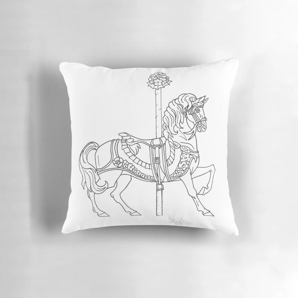 Hand-drawn illustration of a carousel horse printed on a decorative throw pillow