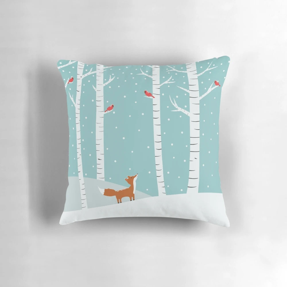 Vibrant hand-painted pillow featuring a fox and cardinals in a winter forest scene