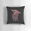 A handcrafted pillow featuring a whimsical illustration of a Highland cow with a ginger coat.