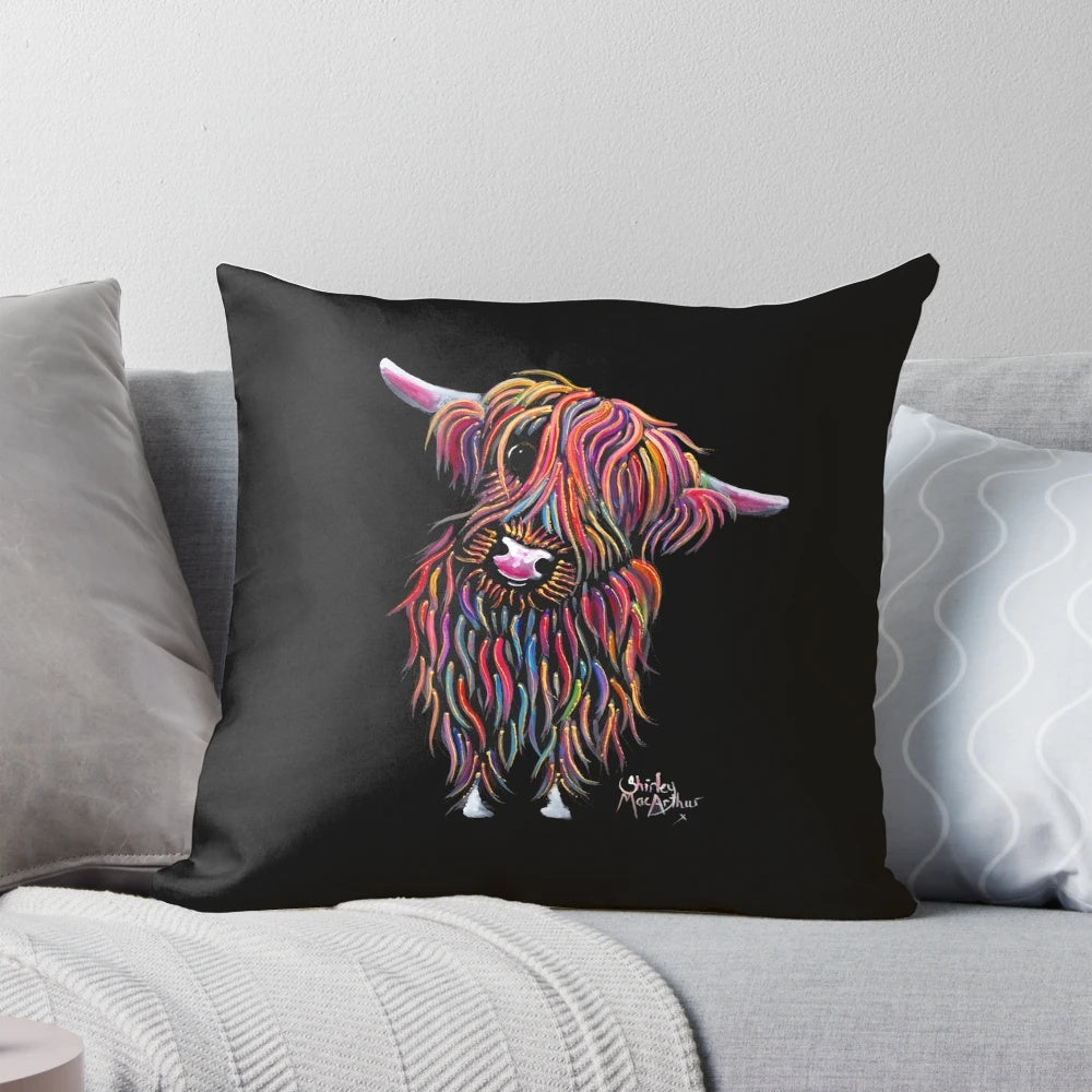A handcrafted pillow featuring a whimsical illustration of a Highland cow with a ginger coat.