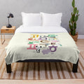 Plush blanket featuring hand-drawn illustrations of Korean alphabet and cute animals