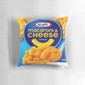 Colorful and whimsical handcrafted pillow featuring a macaroni and cheese design