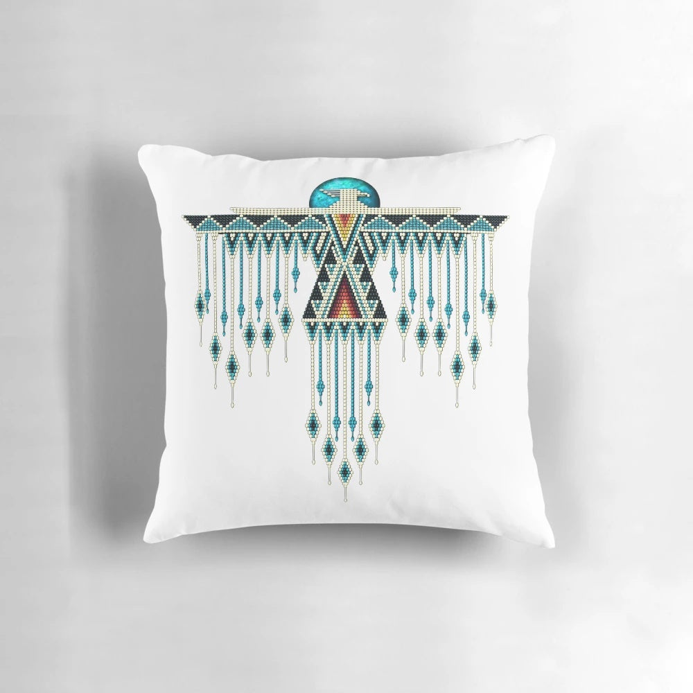 A beautiful handmade native american southwest-style turquoise thunderbird pillow