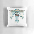 A beautiful handmade native american southwest-style turquoise thunderbird pillow