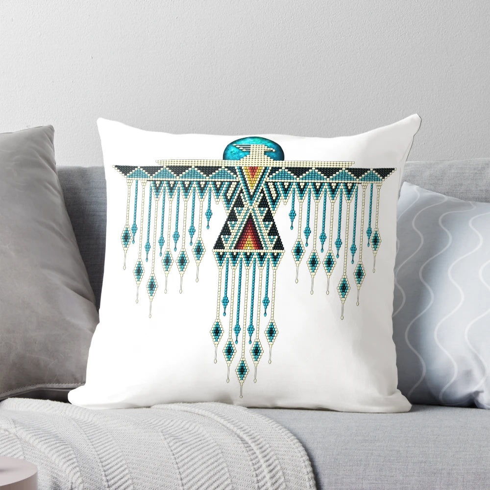 A beautiful handmade native american southwest-style turquoise thunderbird pillow