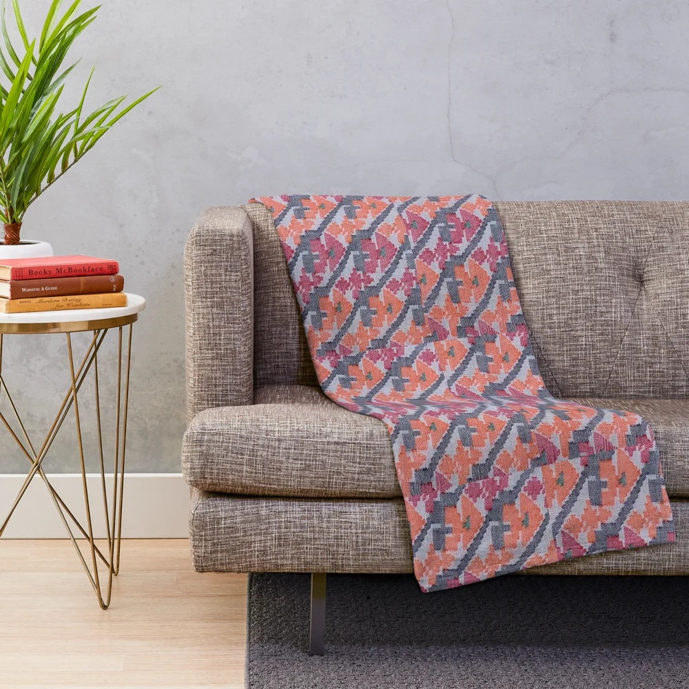 Handcrafted plush blanket featuring a vibrant Nepali art inspired design
