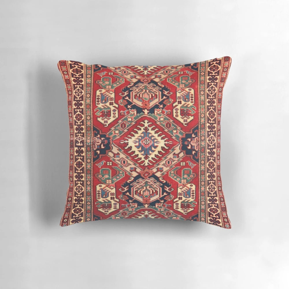 Photograph of a beautifully crafted oriental rug pillow, featuring intricate patterns and vibrant colors.