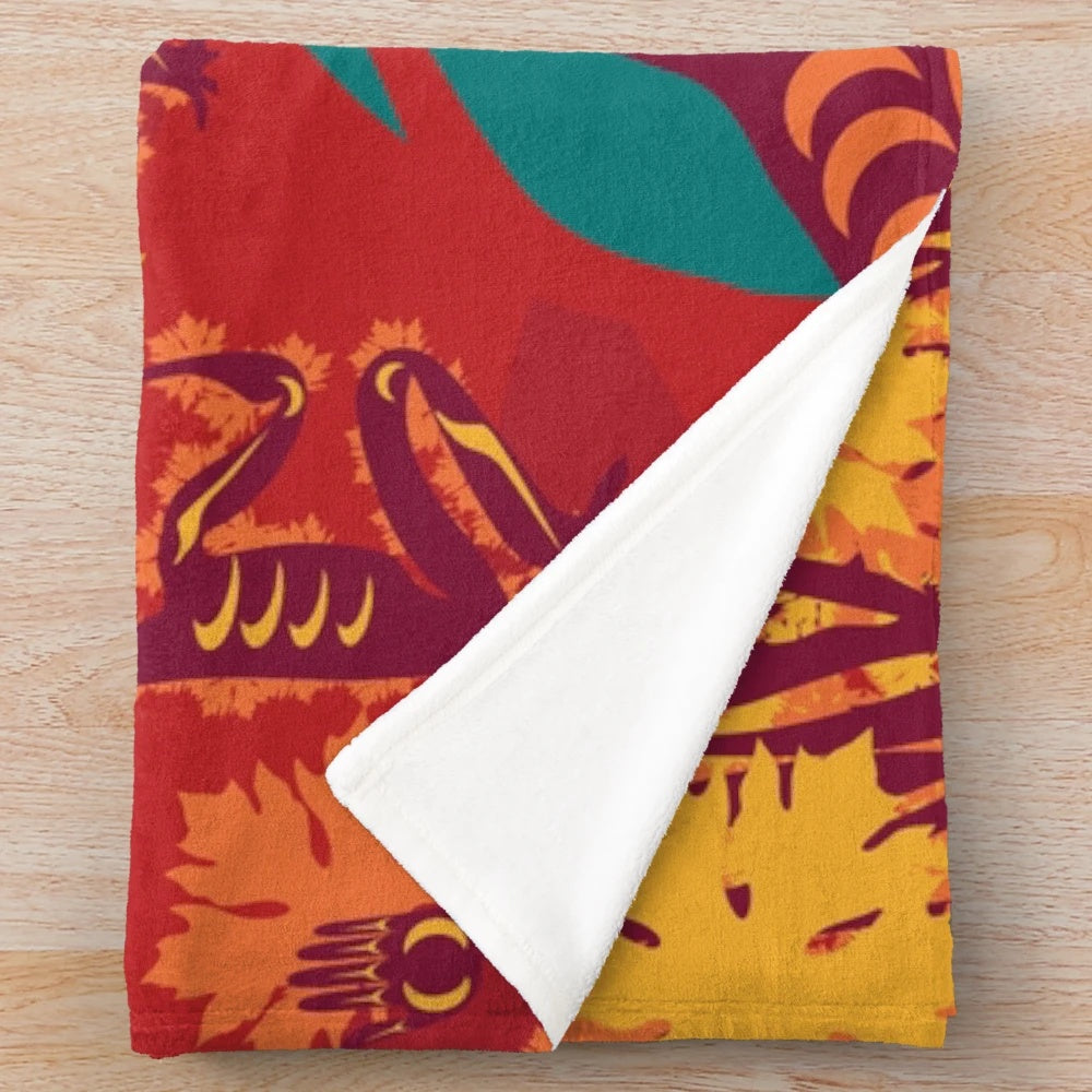Coast Salish-inspired plush blanket with maple, salmon, and forest motifs