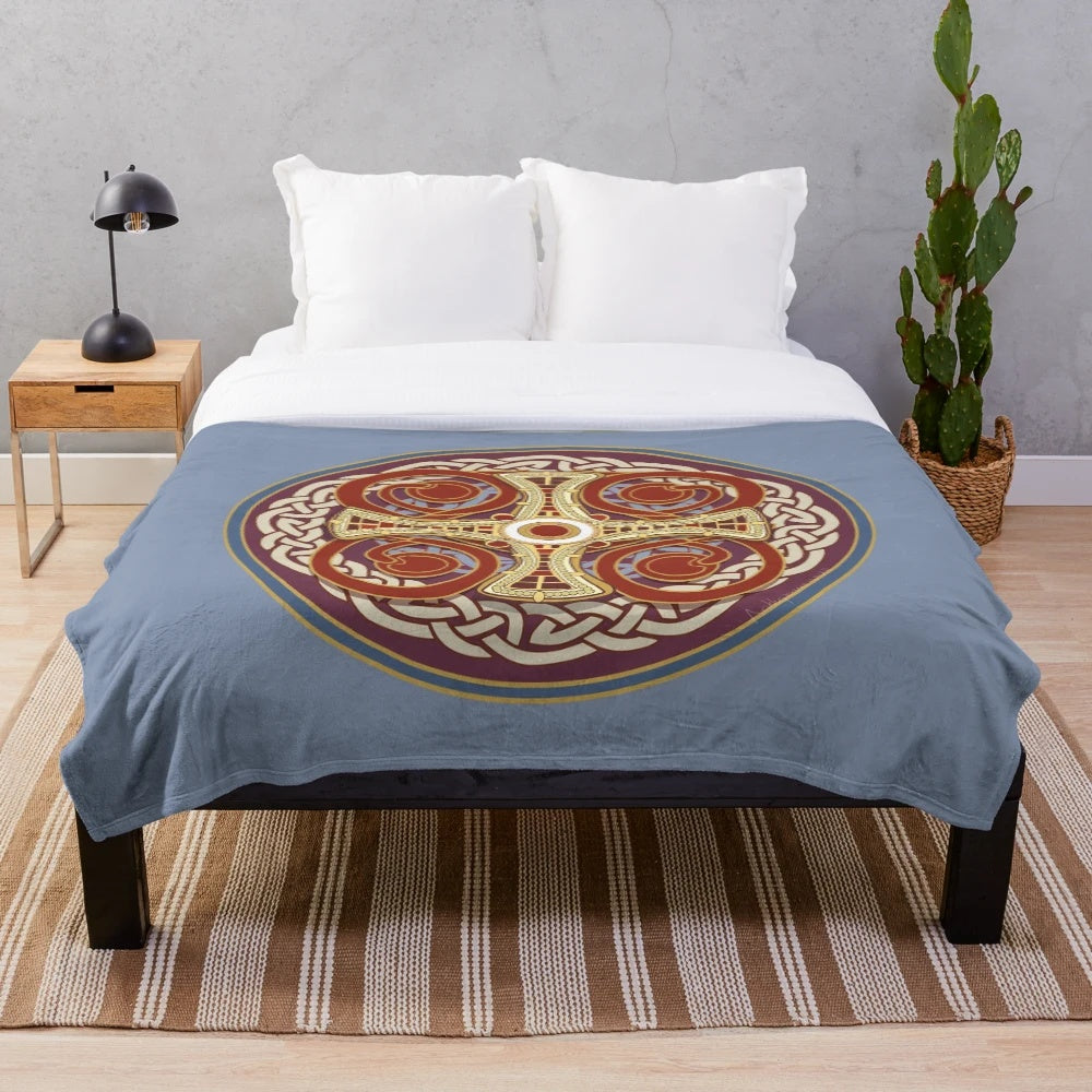 St Cuthbert plush blanket featuring a traditional Celtic knot pattern