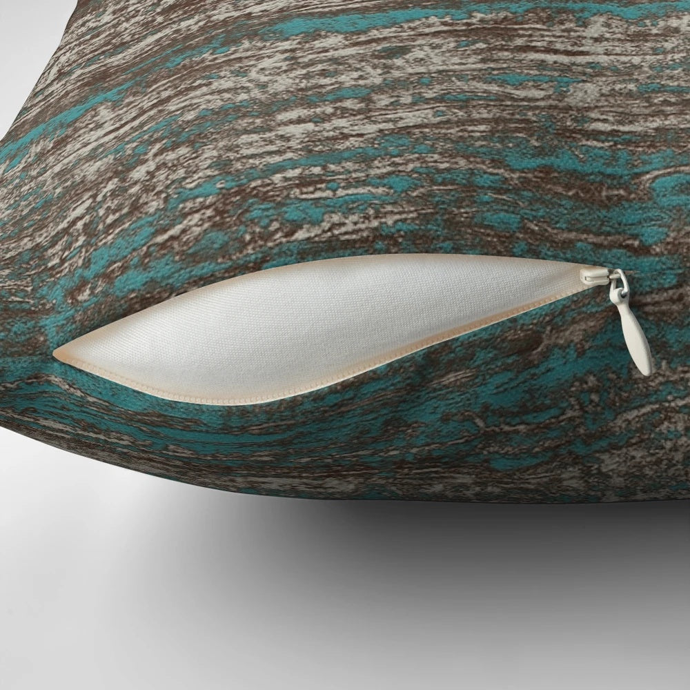 Teal blue melange throw pillow with a wavy stripe texture
