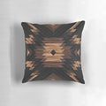 Handcrafted wood pillow featuring a bold tribal pattern design
