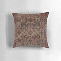Decorative vintage-style Persian carpet pillow with intricate floral and geometric patterns