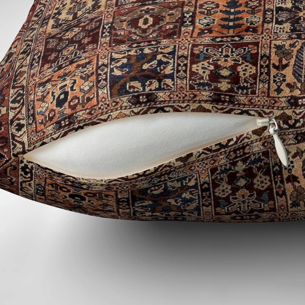 Decorative vintage-style Persian carpet pillow with intricate floral and geometric patterns