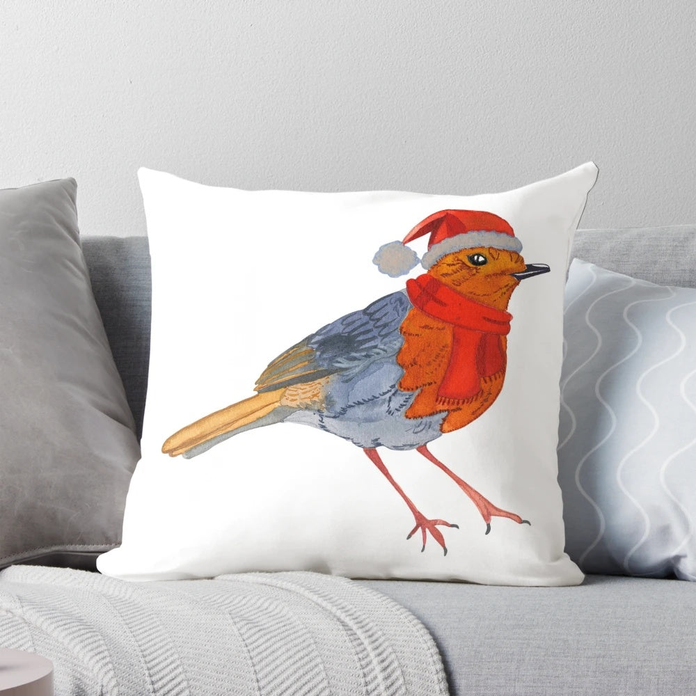 A beautiful watercolor painting of a robin bird on a soft, decorative throw pillow.