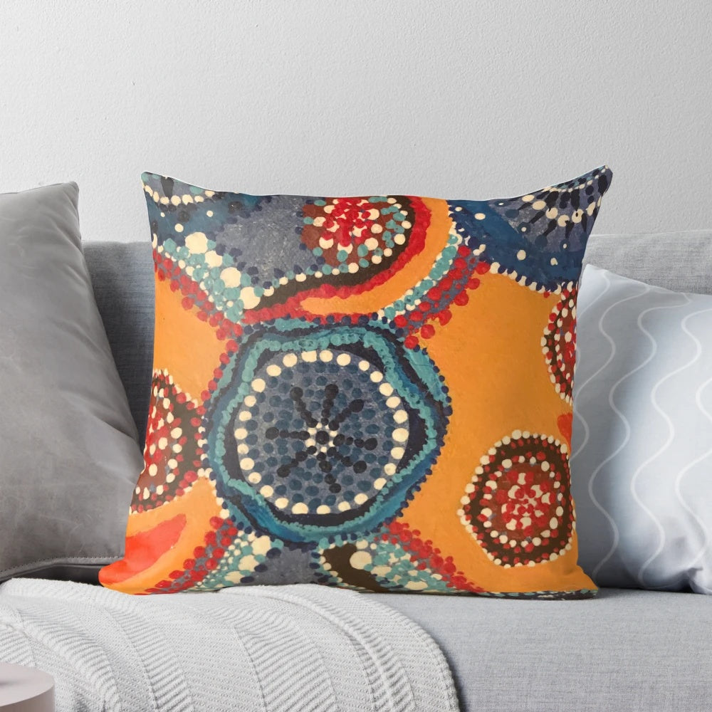 Vibrant aboriginal dot art pillow featuring a river miles design by Australian artist Melody Chime