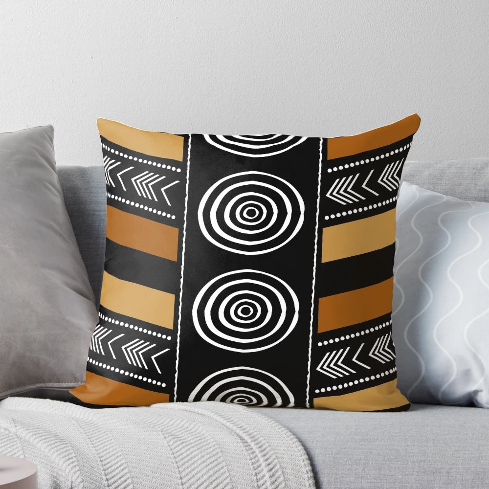 Decorative pillow featuring a vibrant African mud cloth design