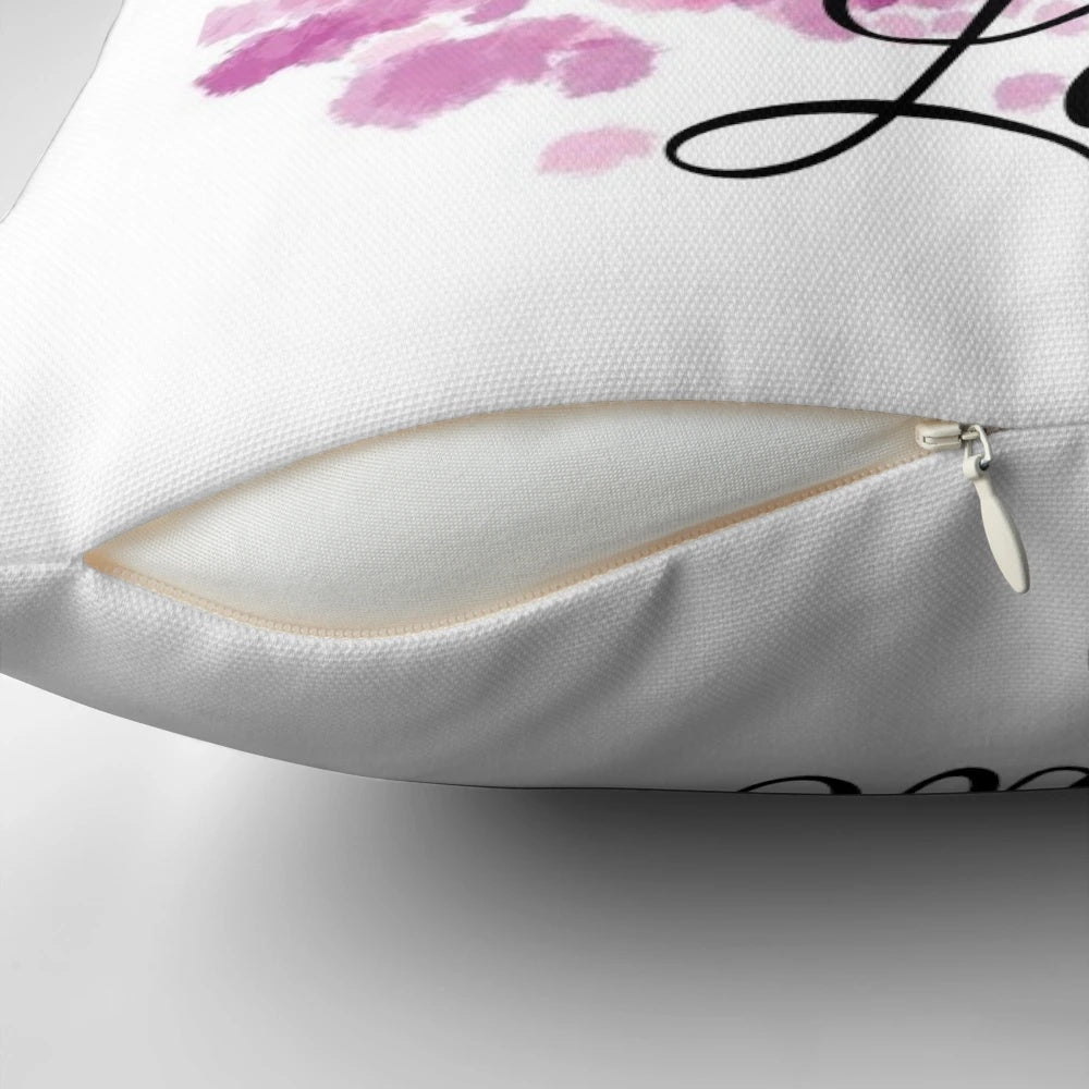 Amor stitch inspired decorative pillow with a cozy, handmade design