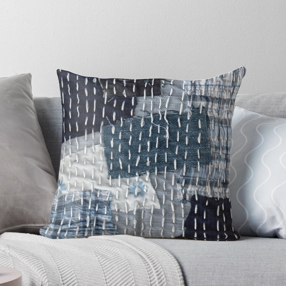 Handmade boro sashiko patterned pillow with blue and red striped design