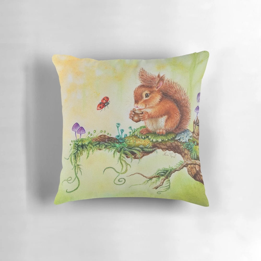 Decorative pillow featuring a hand-painted watercolor design of a squirrel and ladybug by artist Maria Tiqwah