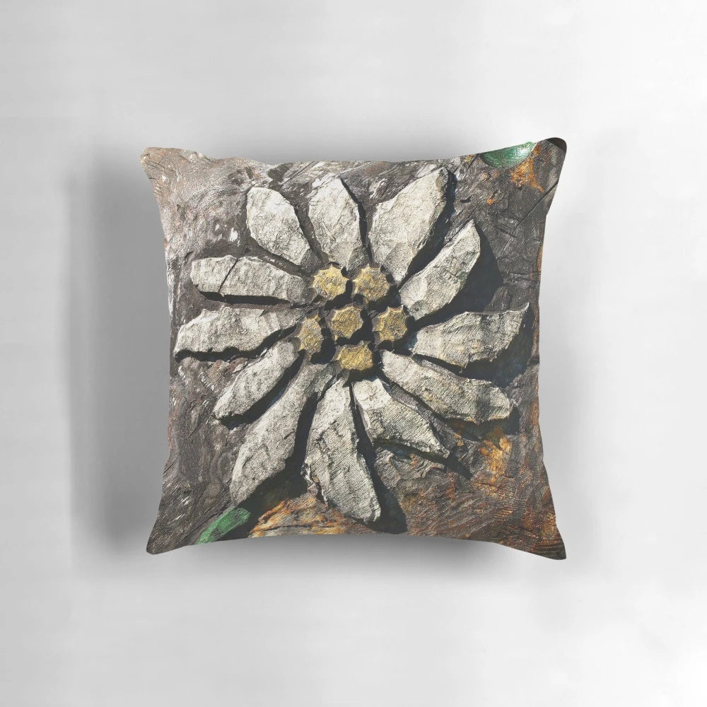 Closeup of a handmade edelweiss wood carving pillow, featuring intricate details and a natural, rustic aesthetic.