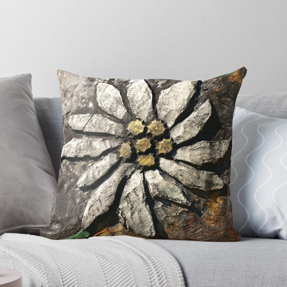 Closeup of a handmade edelweiss wood carving pillow, featuring intricate details and a natural, rustic aesthetic.