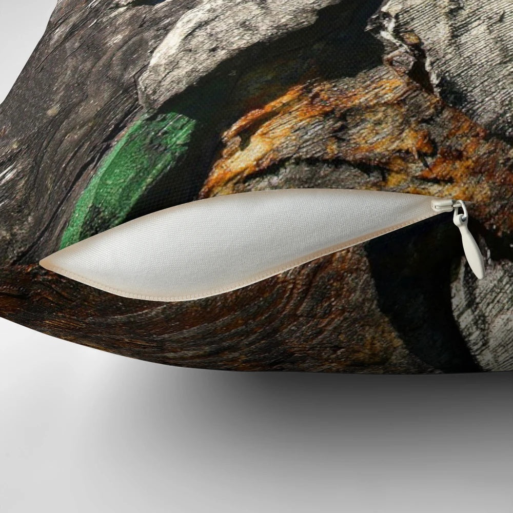Closeup of a handmade edelweiss wood carving pillow, featuring intricate details and a natural, rustic aesthetic.