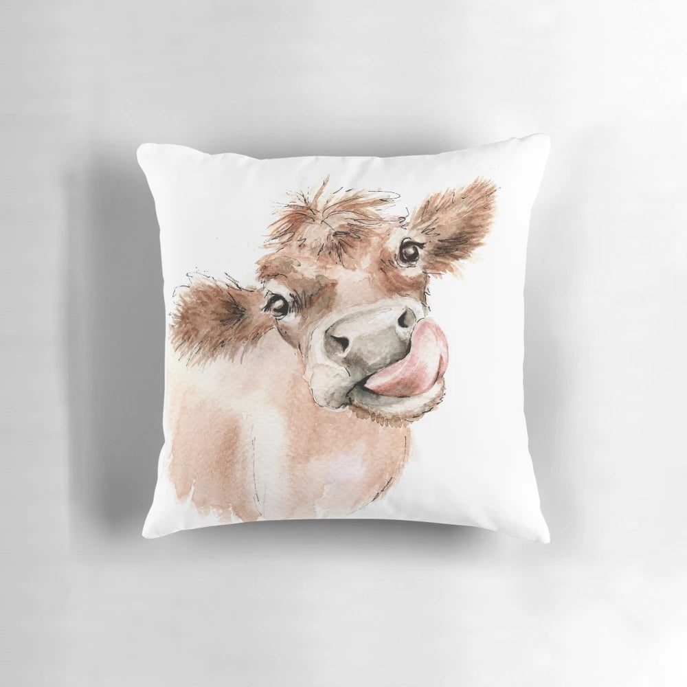 Vibrant watercolor painting of a funky cow on a throw pillow