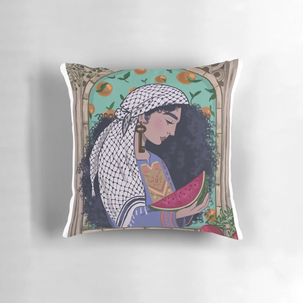 Vibrant, intricately patterned Palestinian kuffiyah-inspired pillow with a "Land of Sad Oranges" design.