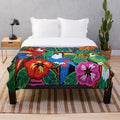 Mola design plush blanket with indigenous Kuna motifs