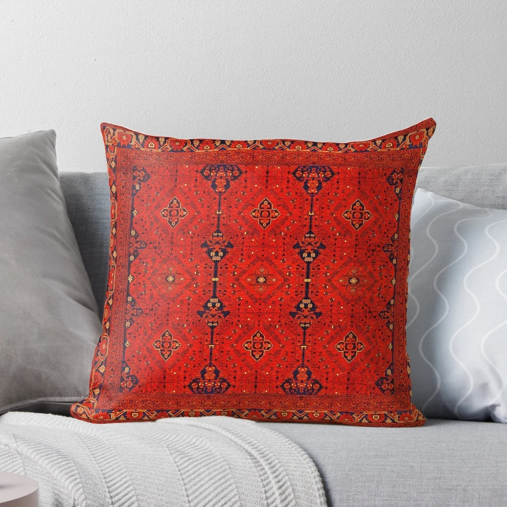 Vibrant red and patterned Moroccan-style boho pillow with traditional heritage design
