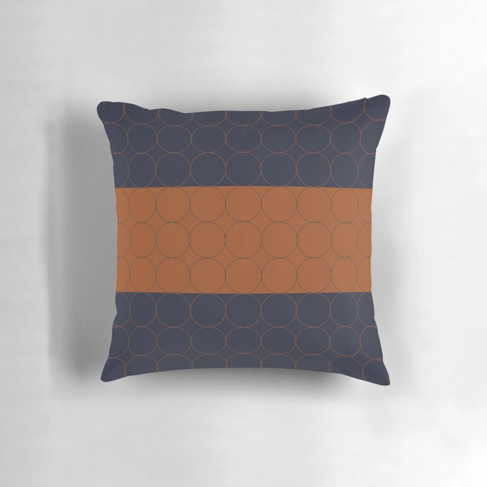 Navy blue and rust colored circles decorative throw pillow