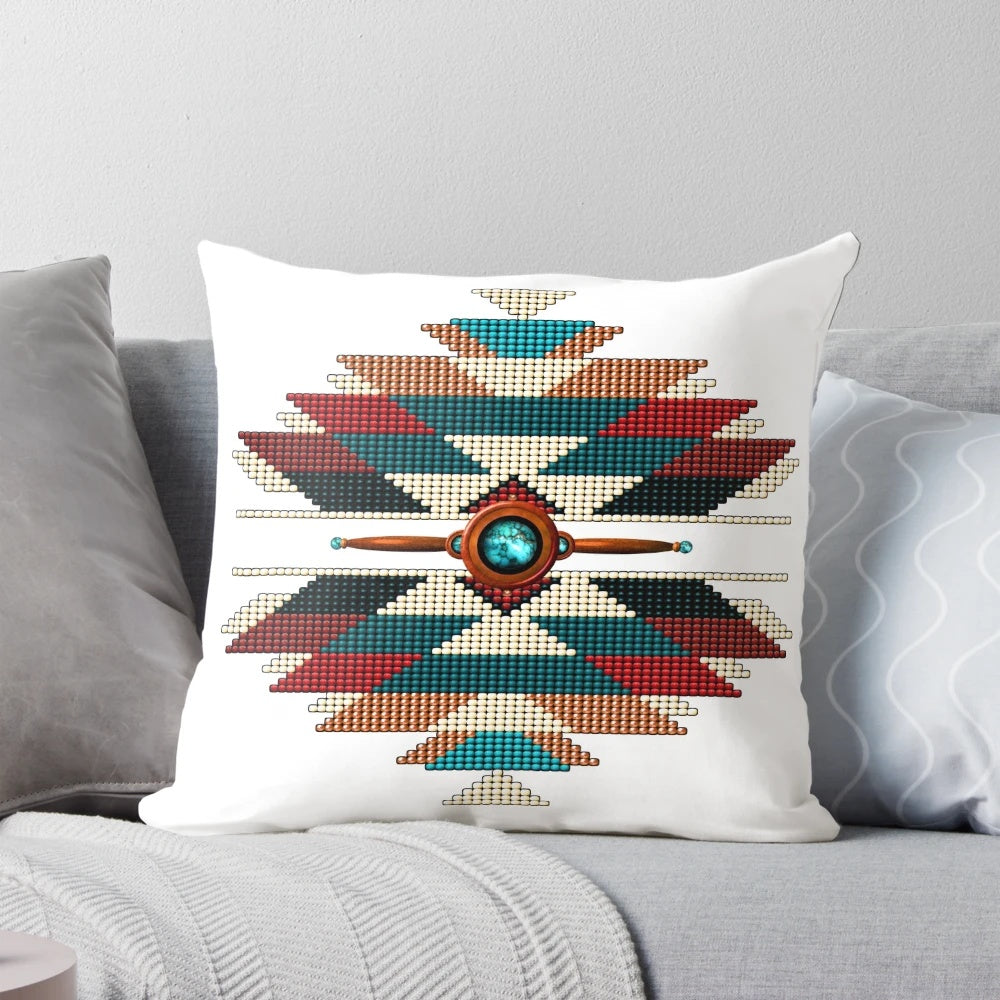 Handmade southwestern style decorative pillow with a sunburst beadwork design