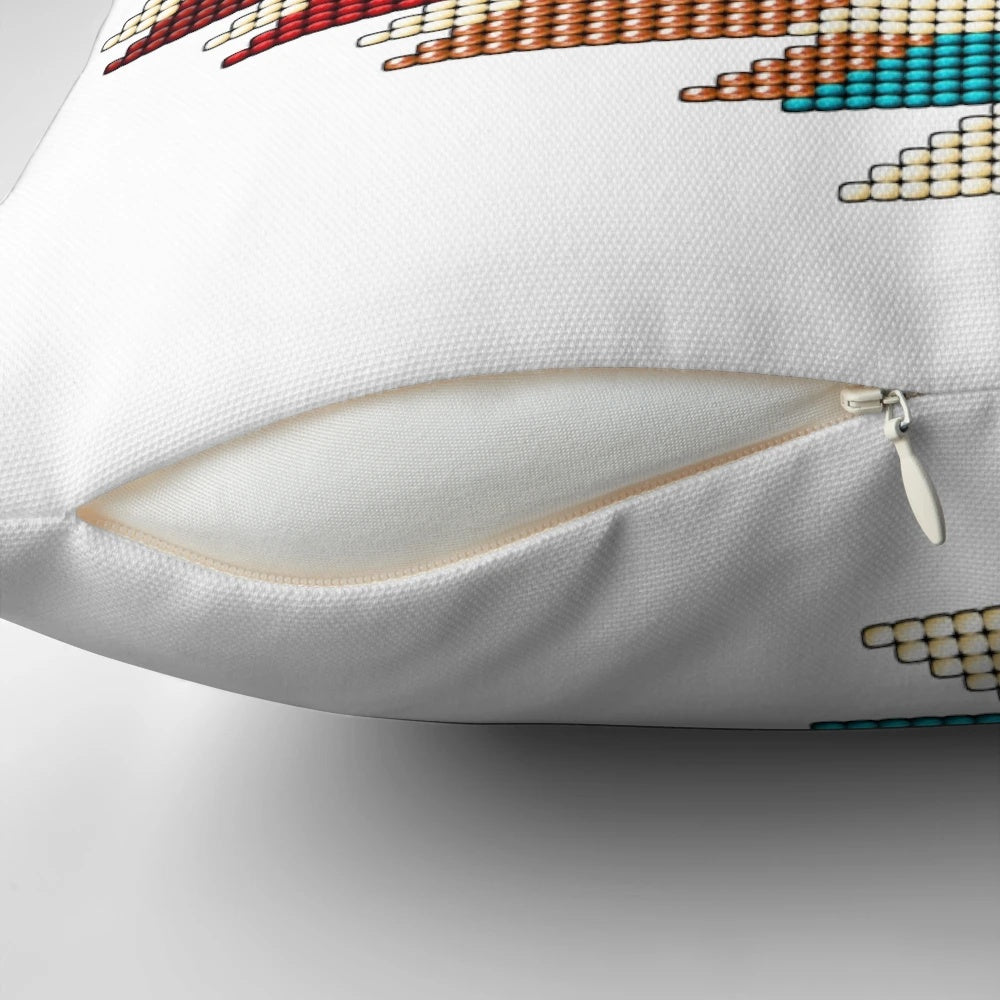 Handmade southwestern style decorative pillow with a sunburst beadwork design