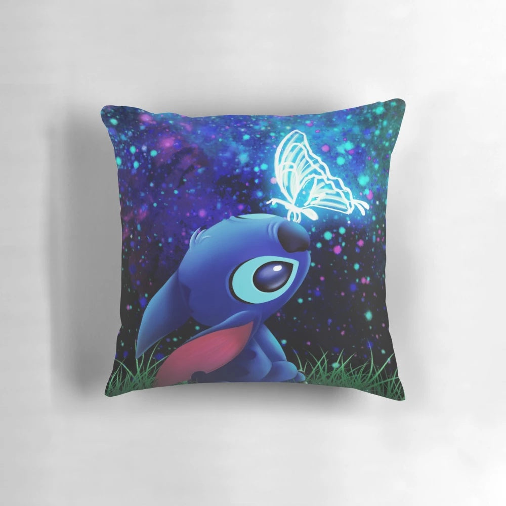 Handmade embroidered pillow featuring a stitch butterfly design against a starry night sky background.
