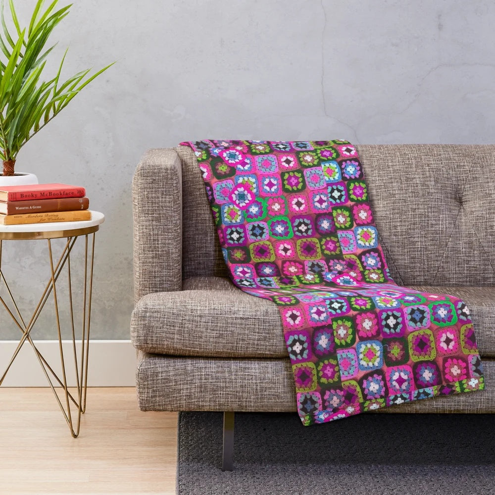 Colorful vintage-style crochet blanket with granny square pattern